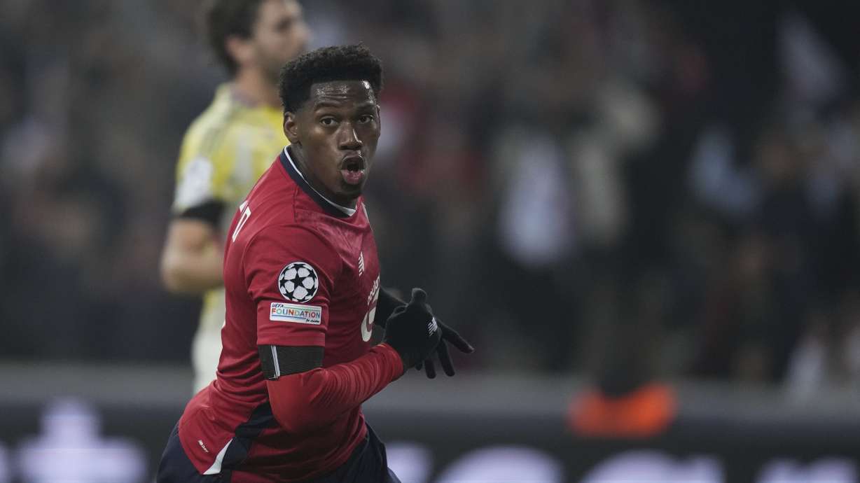 FILE - Lille's Jonathan David celebrates after scoring the opening goal during the Champions League opening phase soccer match between Lille and Juventus at the Stade Pierre Mauroy in Villeneuve-d'Ascq, outside Lille, France, Tuesday, Nov. 5, 2024.