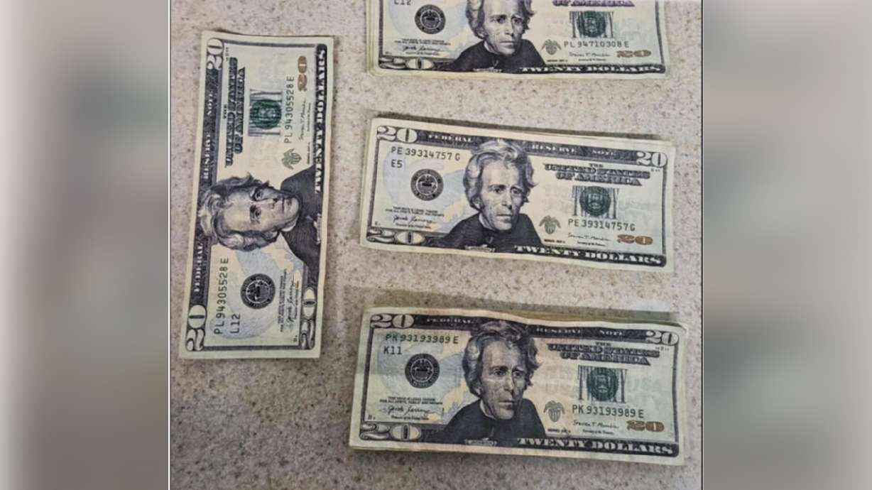 Counterfeit $20 bills were discovered at a Layton Walmart. Police urge those who shopped at this location on Dec. 24 to compare serial numbers with the counterfeit cash.