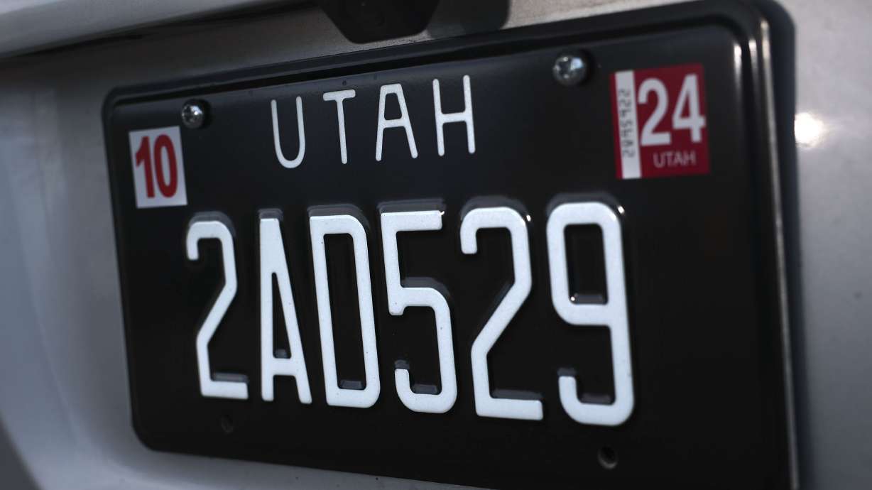 A Legacy license plate is pictured in Murray on Dec. 6, 2023. From changes to license plate requirements to smartphone protections for children, several new Utah laws will go into effect on Wednesday.