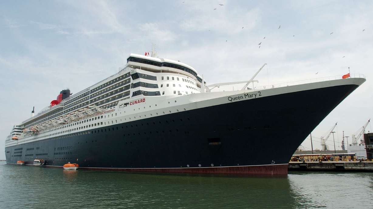 Queen Mary 2 is pictured docked at the Port of Callao, Peru, Feb. 11. 2006. More than 320 people reported feeling ill during a norovirus outbreak in late December aboard the ship, the CDC says.