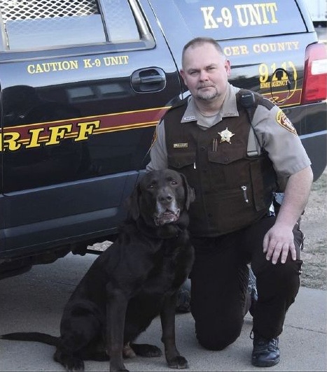 This undated photo shows Mercer County sheriff's deputy Paul Martin with his K-9 Goliath. Martin Dec. 6, 2023, in a crash involving a senator's son. Ian Cramer was sentenced to 28 years in prison.