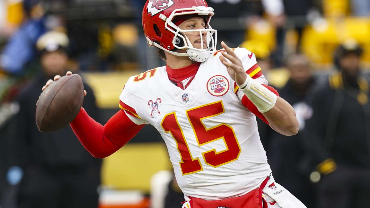 Kansas City Chiefs quarterback Patrick Mahomes (15) passes against the Pittsburgh Steelers during the first half of an NFL football game, Wednesday, Dec. 25, 2024, in Pittsburgh.