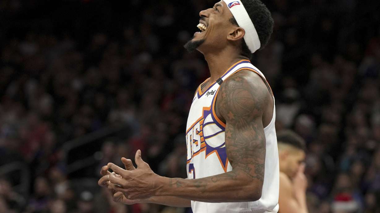 Phoenix Suns guard Bradley Beal reacts after scoring against the Denver Nuggets during the second half of an NBA basketball game, Wednesday, Dec. 25, 2024, in Phoenix. Phoenix won 110-100.