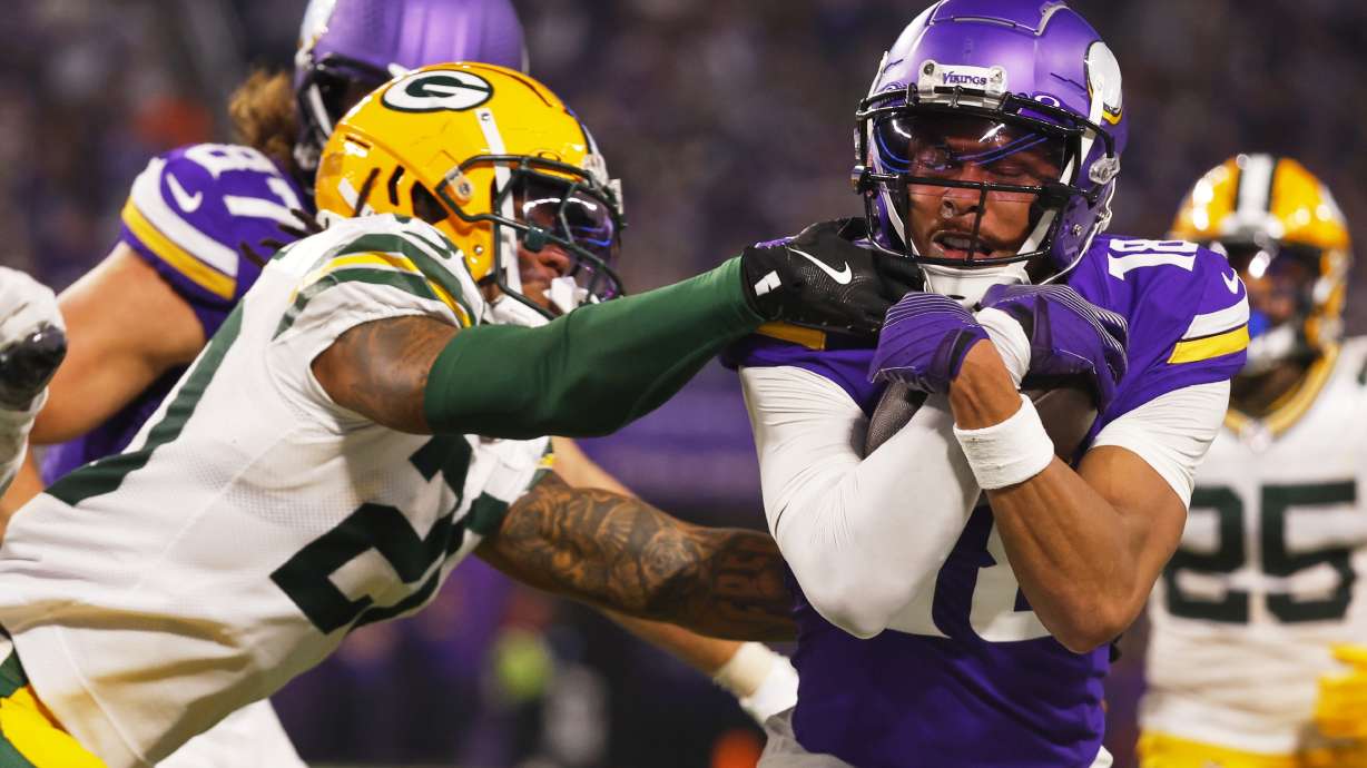 Minnesota Vikings' Justin Jefferson tries to get past Green Bay Packers' Javon Bullard during the second half of an NFL football game Sunday, Dec. 29, 2024, in Minneapolis.