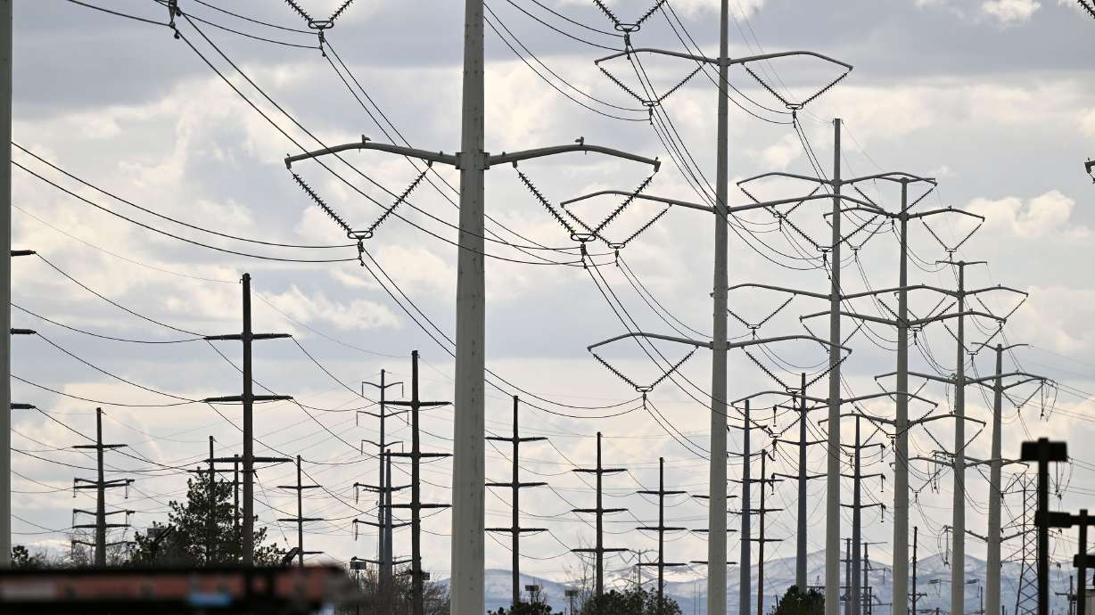 Power lines are pictured in Salt Lake City near the airport on March 11. Nearly 1 in 4 Utahns struggle to pay their utility bills, according to new census data.