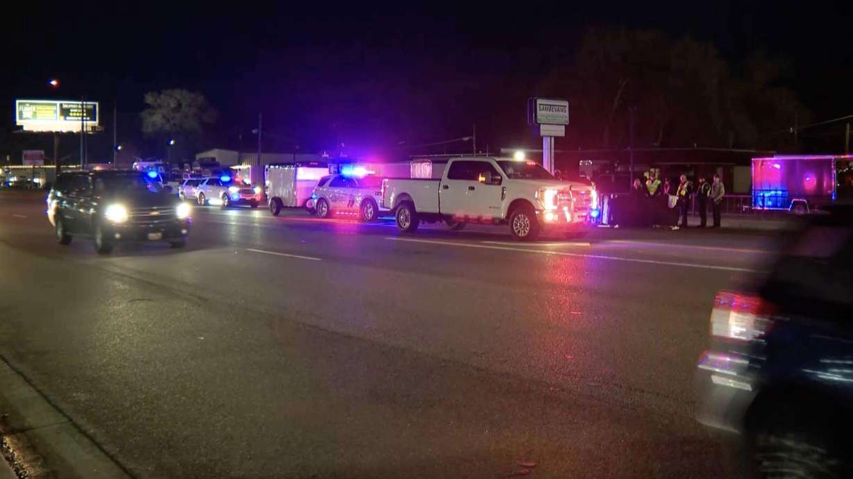 Police investigate after a pedestrian was hit and killed while crossing a street at 33rd Street and Wall Avenue in Ogden on Monday afternoon.