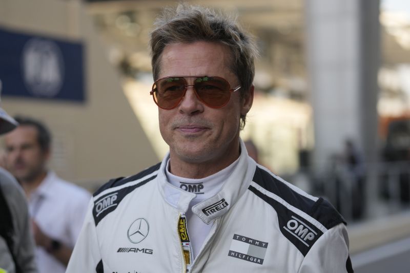 American actor Brad Pitt walks in the pit lane before the Formula One Abu Dhabi Grand Prix at the Yas Marina Circuit in Abu Dhabi, United Arab Emirates, Dec. 8.