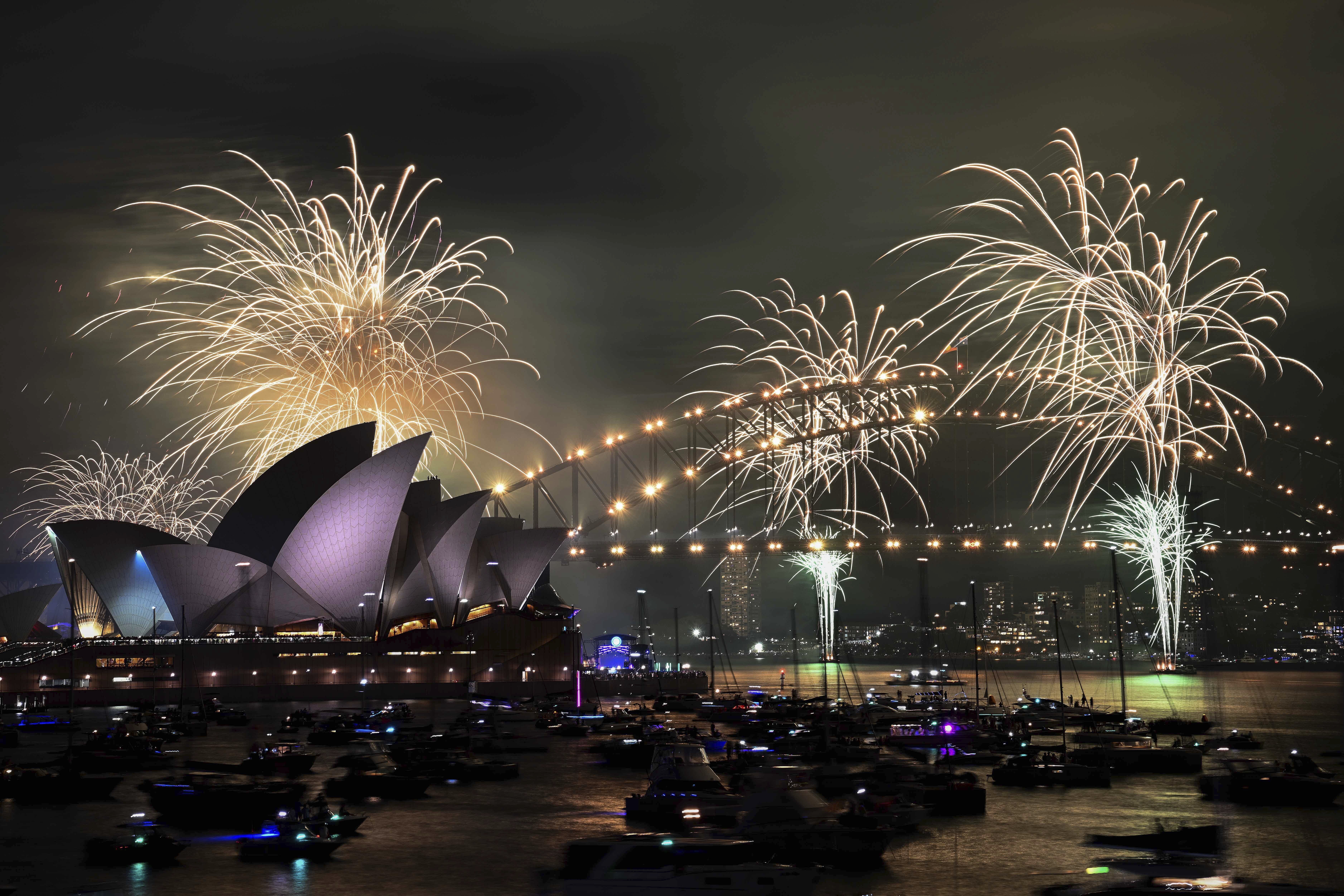 The world welcomes 2025 with light shows, embraces and ice plunges