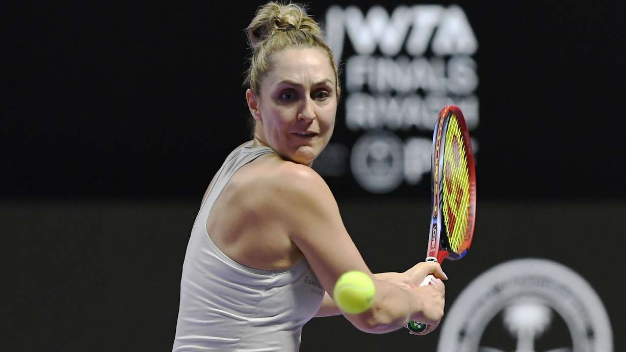 FILE - Canada's Gabriela Dabrowski plays a shot next to New Zealand's Erin Routliffe during their women's doubles match against Taylor Townsend of the U.S. and Katerina Siniakova of the Czech Republic in the final of the WTA finals at King Saud University Indoor Arena, in Riyadh, Saudi Arabia, Saturday, Nov. 9, 2024.