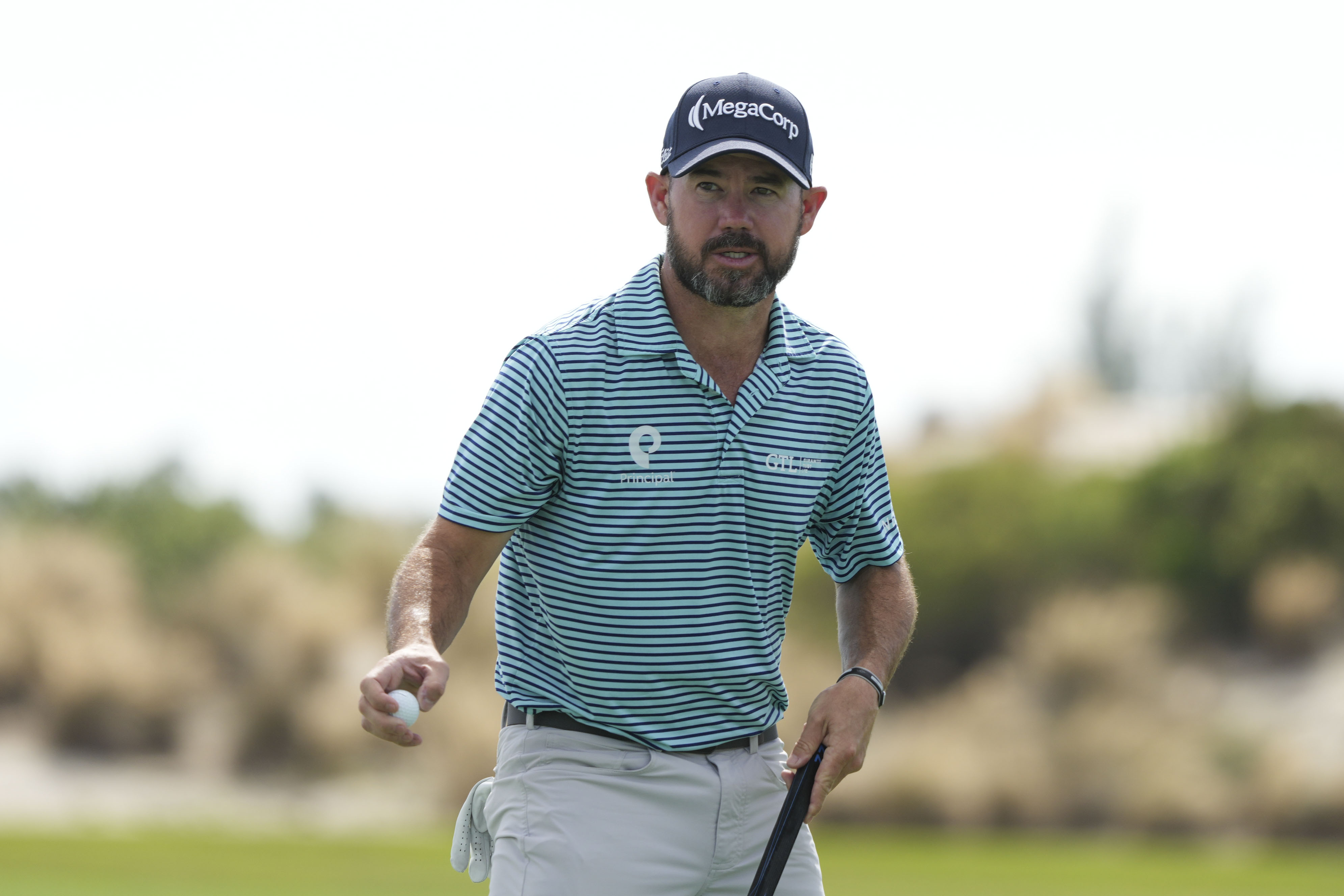 Brian Harman, of the United States, reacts to his putt on the third hole during the first round of the Hero World Challenge PGA Tour at the Albany Golf Club, in New Providence, Bahamas, Thursday, Dec. 5, 2024. 