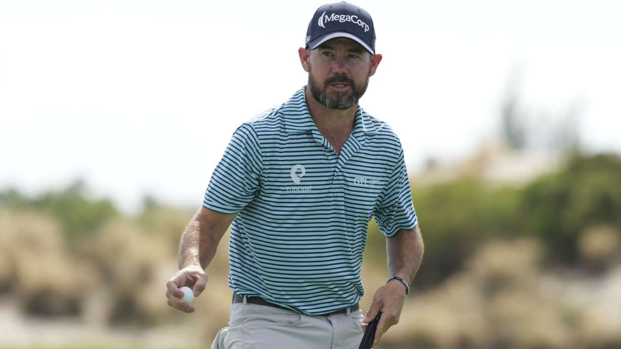 Brian Harman, of the United States, reacts to his putt on the third hole during the first round of the Hero World Challenge PGA Tour at the Albany Golf Club, in New Providence, Bahamas, Thursday, Dec. 5, 2024.