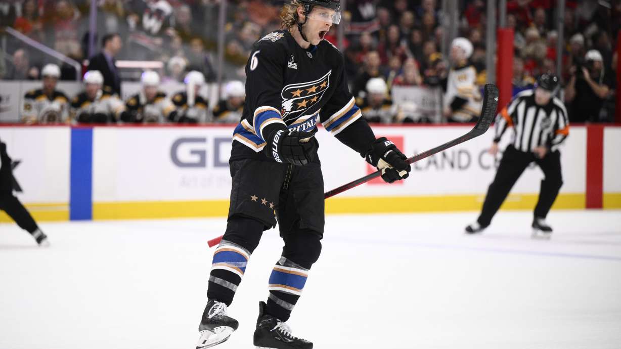 Washington Capitals defenseman Jakob Chychrun (6) celebrates his goal during the first period of an NHL hockey game against the Boston Bruins, Tuesday, Dec. 31, 2024, in Washington.
