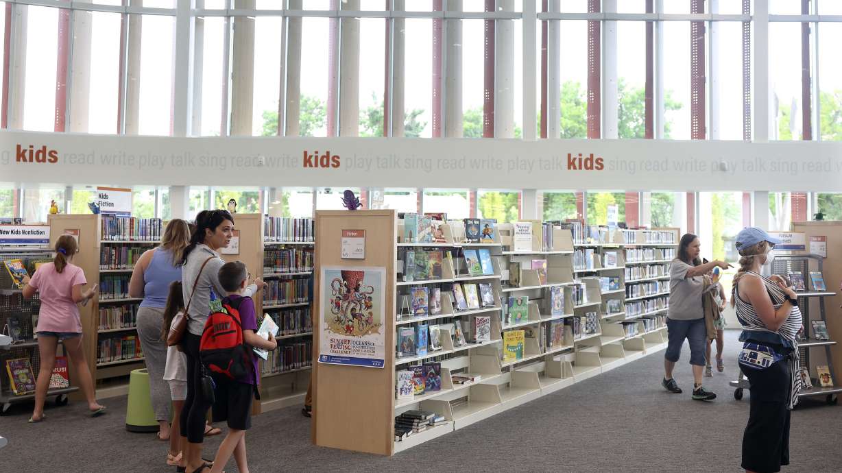People attend the grand opening of the Salt Lake County Library’s Granite branch in South Salt Lake on July 15, 2022.