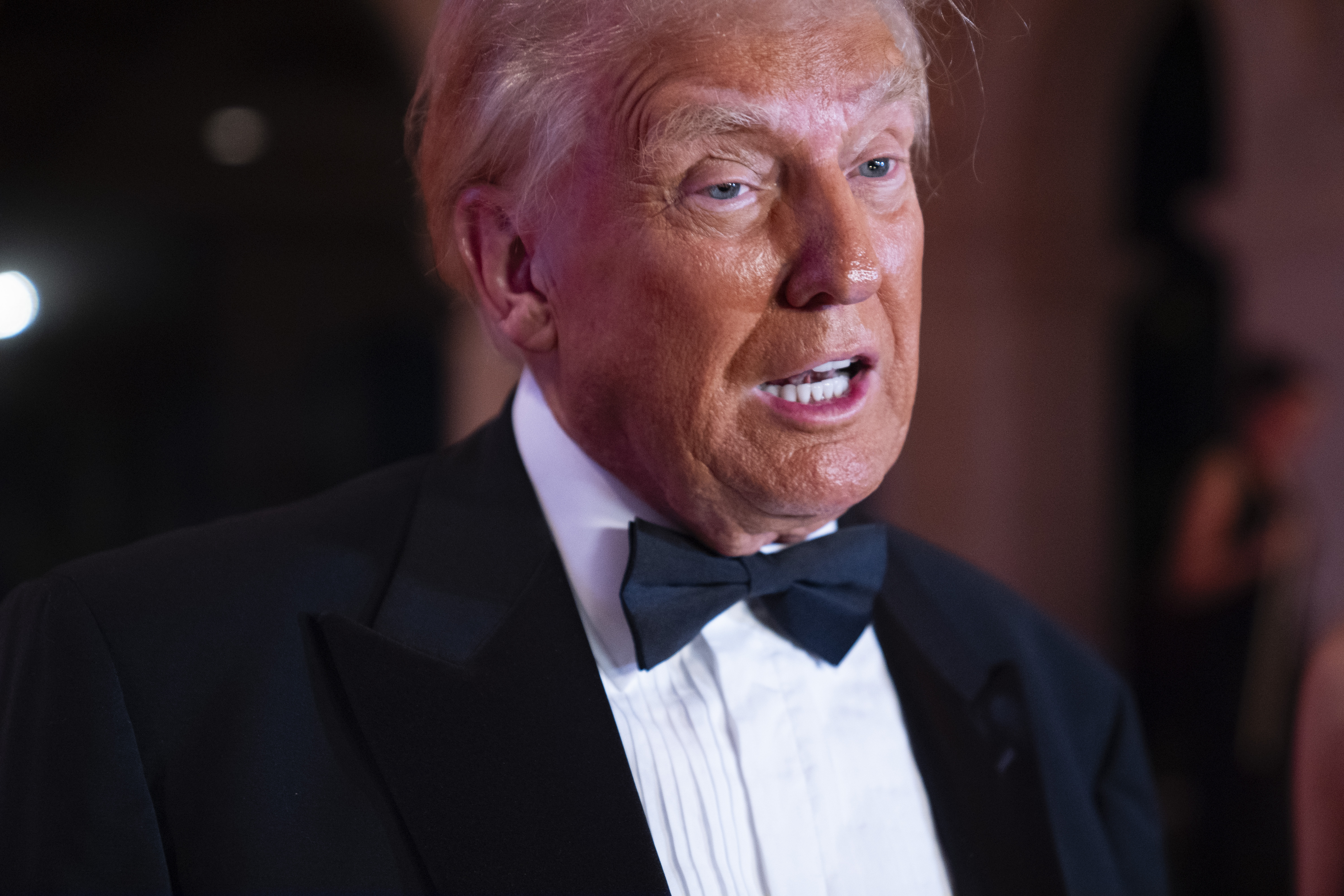 President-elect Donald Trump speaks to reporters before a New Year's Eve party at Mar-a-Lago, Tuesday in Palm Beach, Fla.
