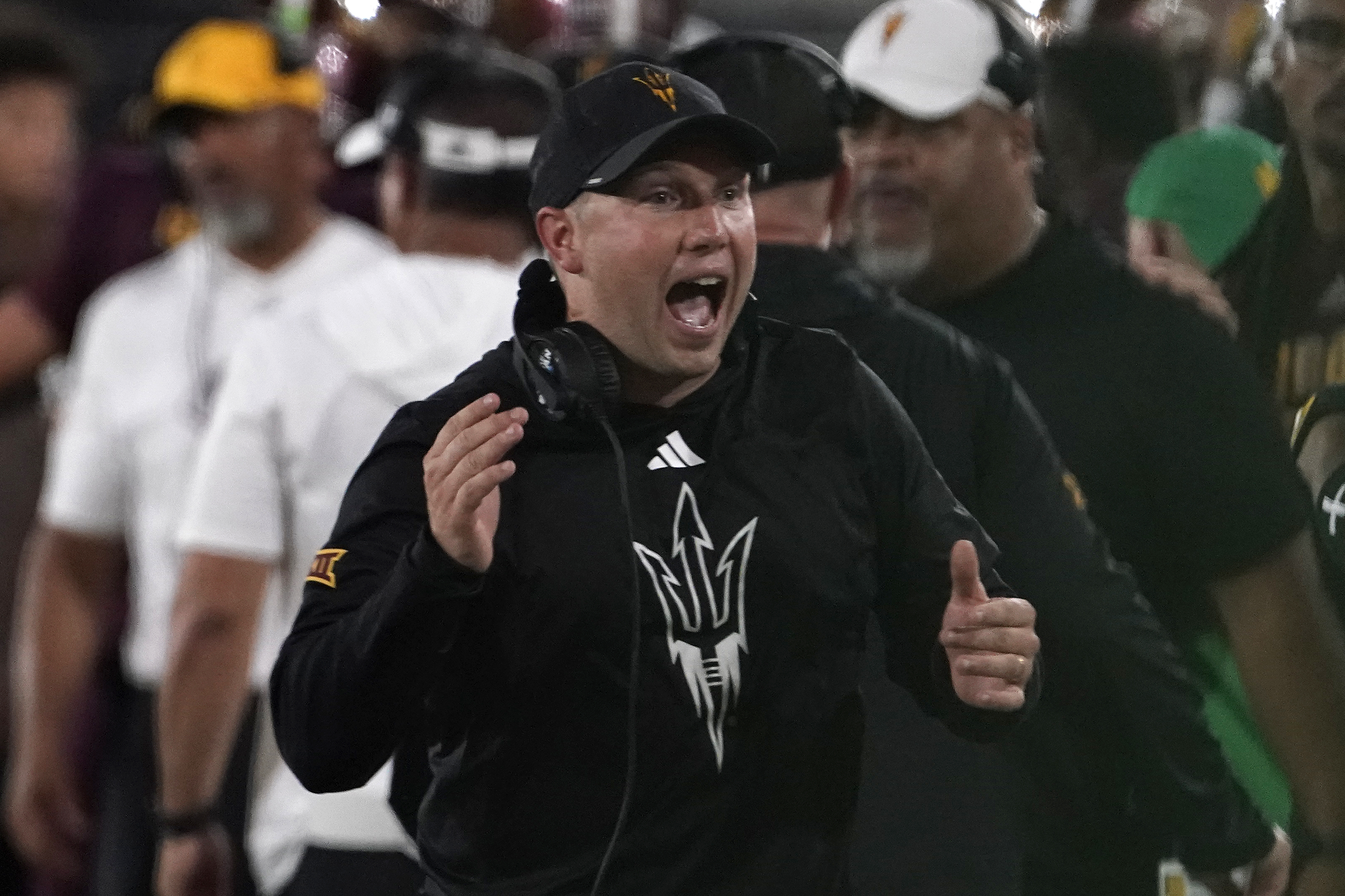 FILE - Arizona State head coach Kenny Dillingham celebrates a touchdown against Kansas during the second half of an NCAA college football game Saturday, Oct. 5, 2024, in Tempe, Ariz.