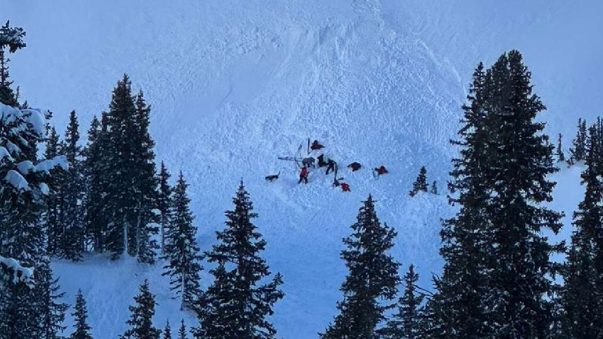 Rescuers start the excavation process after an avalanche killed a man who was split boarding alone in Big Cottonwood Canyon on Tuesday.