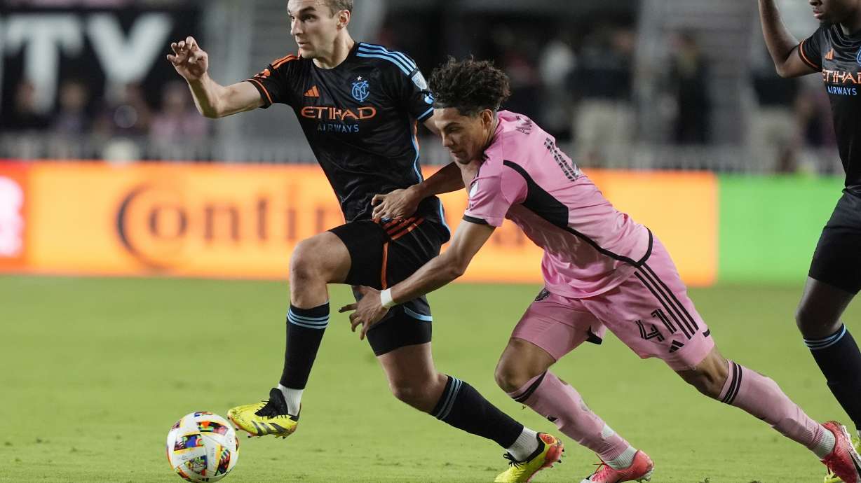 FILE - New York City FC midfielder James Sands (6) takes control of the ball from Inter Miami midfielder David Ruiz (41) during the second half of an MLS soccer match, Saturday, March 30, 2024, in Fort Lauderdale, Fla.