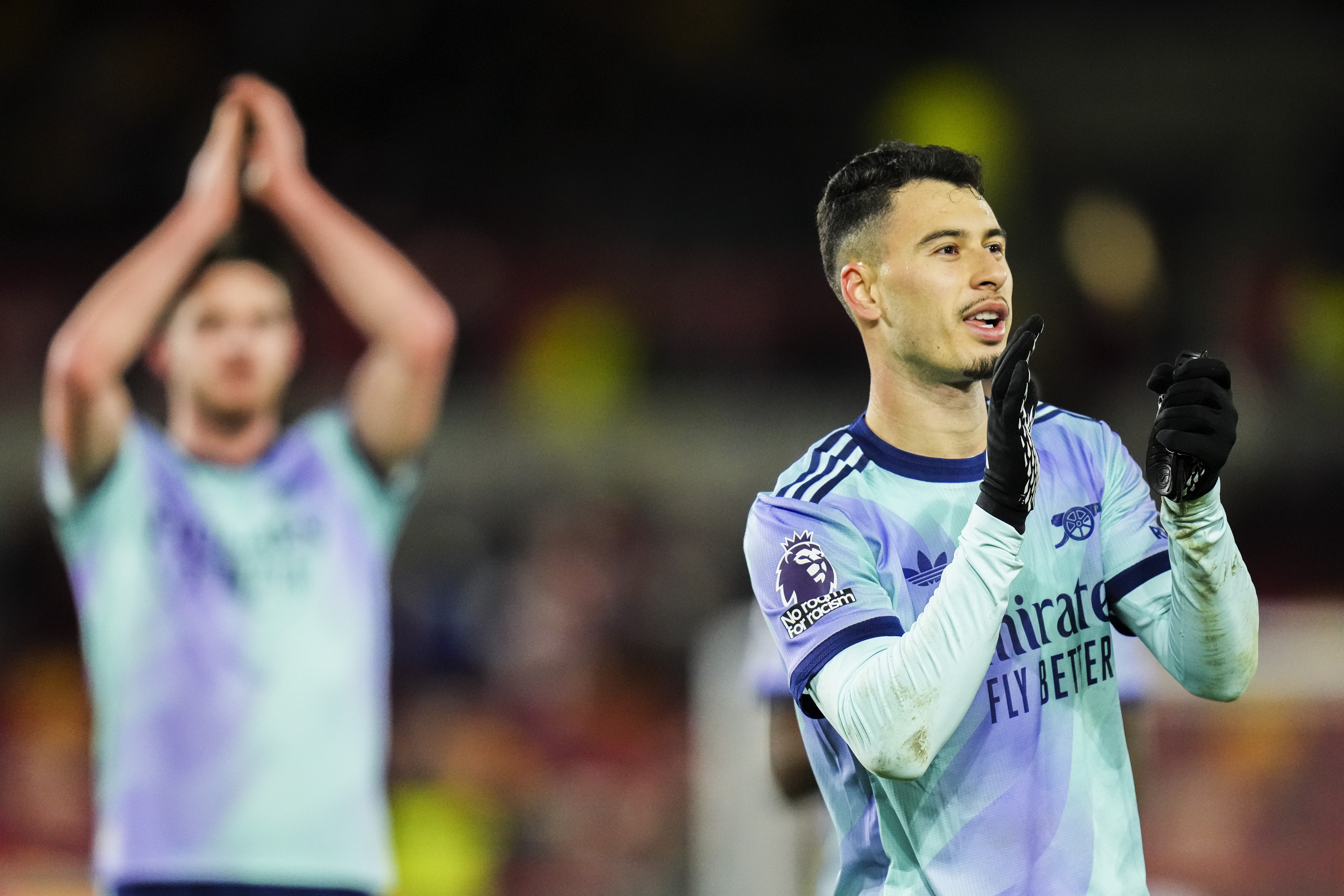 Arsenal's Gabriel Martinelli applauds after the English Premier League soccer match between Brentford and Arsenal at the Gtech Community stadium in London, Wednesday, Jan. 1, 2025.