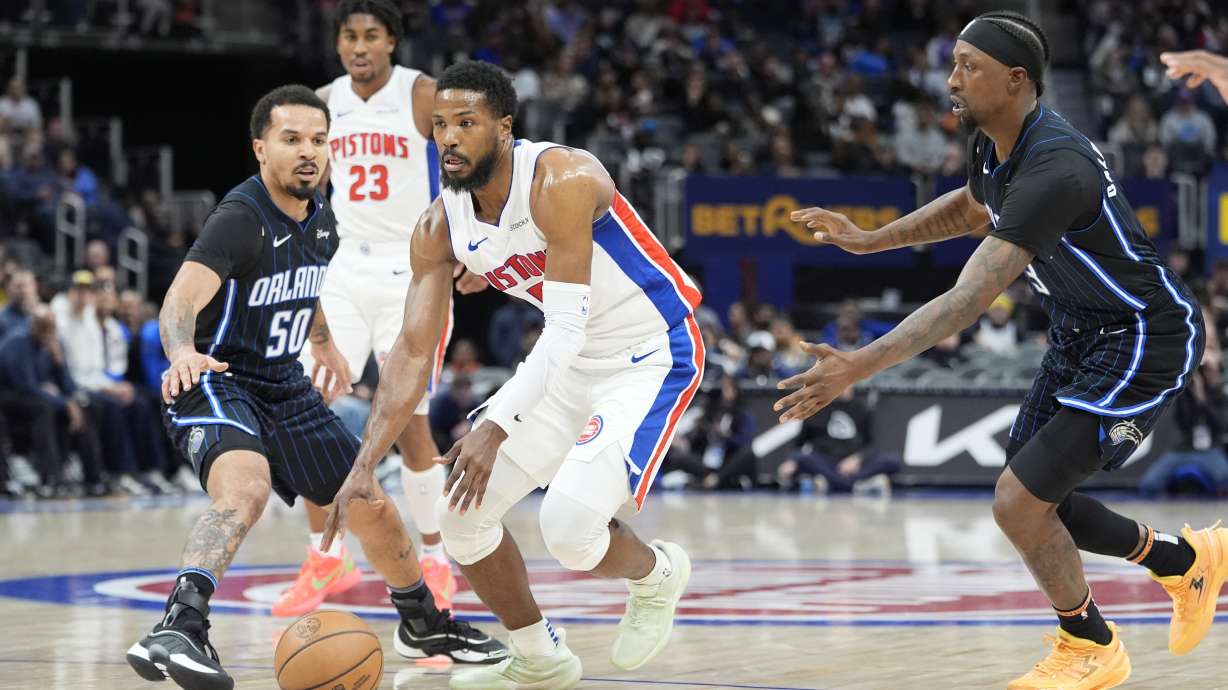 Detroit Pistons guard Malik Beasley (5) passes the ball during the first half of an NBA basketball game against the Orlando Magic, Wednesday, Jan. 1, 2025, in Detroit.