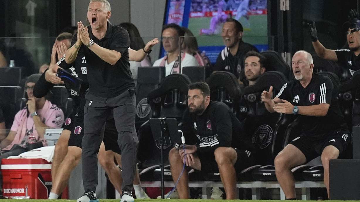 FILE - St. Louis City head coach Bradley Carnell, front left, calls to his players from the sideline during the second half of an MLS soccer match against Inter Miami, Saturday, June 1, 2024, in Fort Lauderdale, Fla.