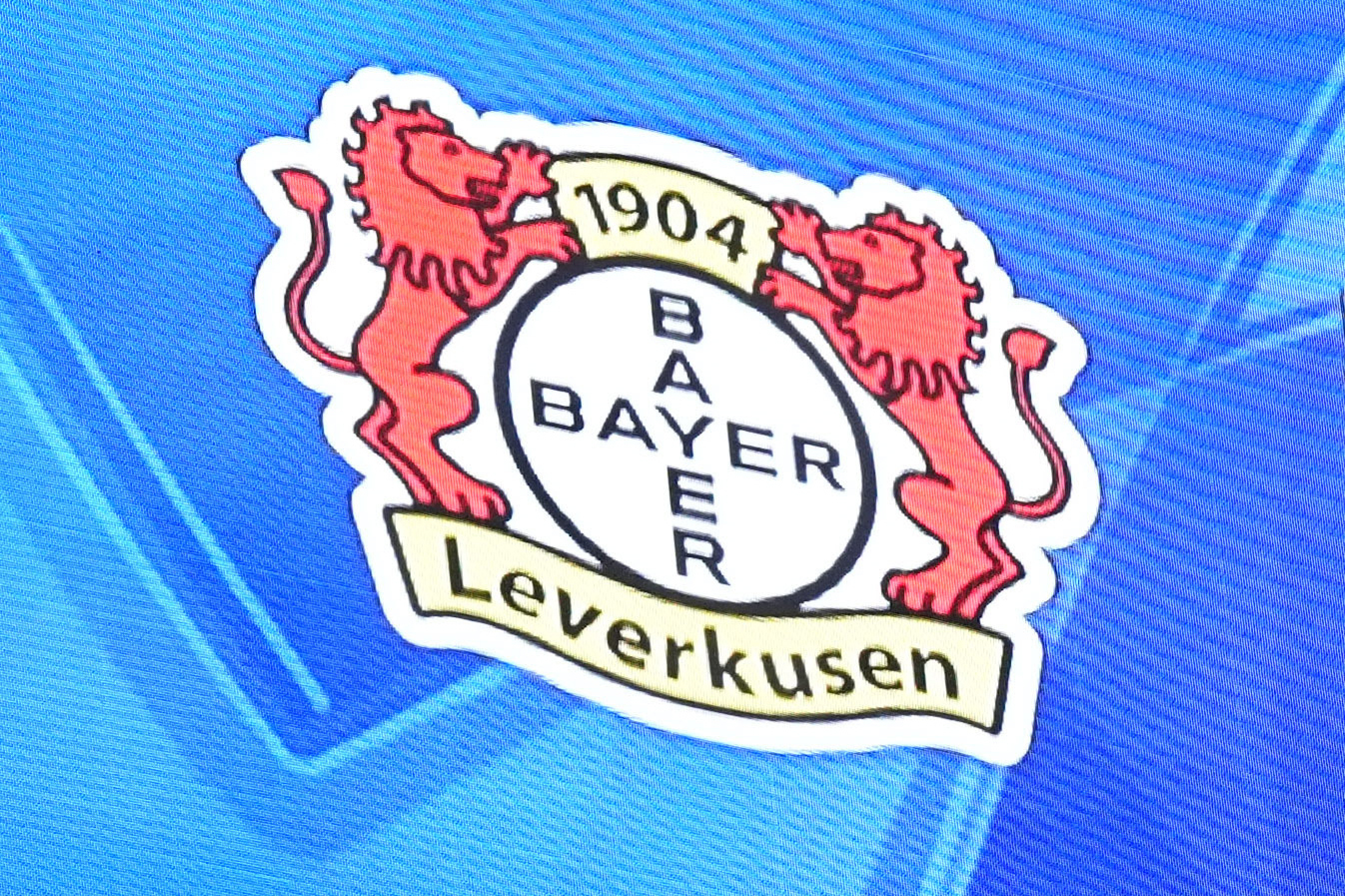 FILE - A score board shows the logo for the soccer team Bayer Leverkusen in Leverkusen, Germany, Tuesday Nov. 26, 2024.