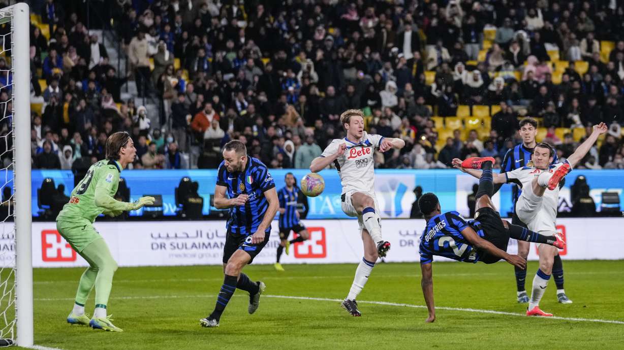 Inter Milan's Denzel Dumfries scores the opening goal during the Italian Super Cup semifinal soccer match between Inter Milan and Atlanta at Al Awwal Park stadium in Riyadh, Saudi Arabia, Thursday, Jan. 2, 2025.