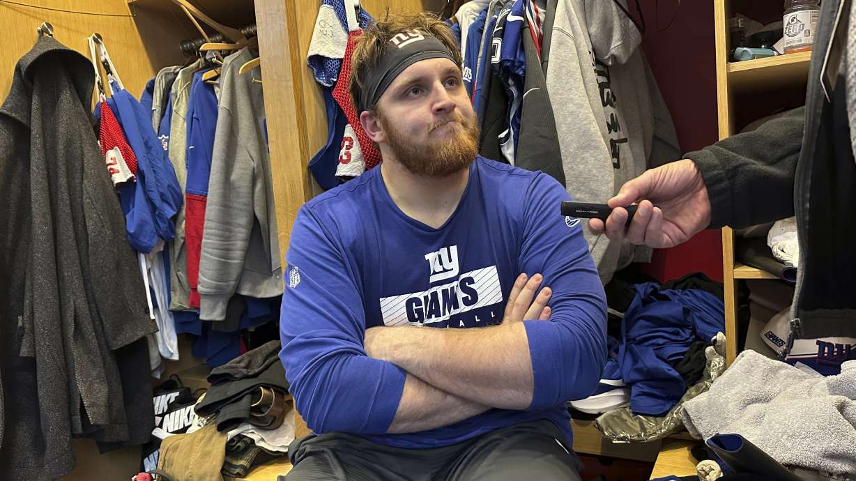 New York Giants rookie guard Jake Kubas sits in the locker room after NFL football practice, Thursday, Jan. 2, 2025. Kubas made the roster as an undrafted free agent from North Dakota State and is now starting at right guard for the Giants.