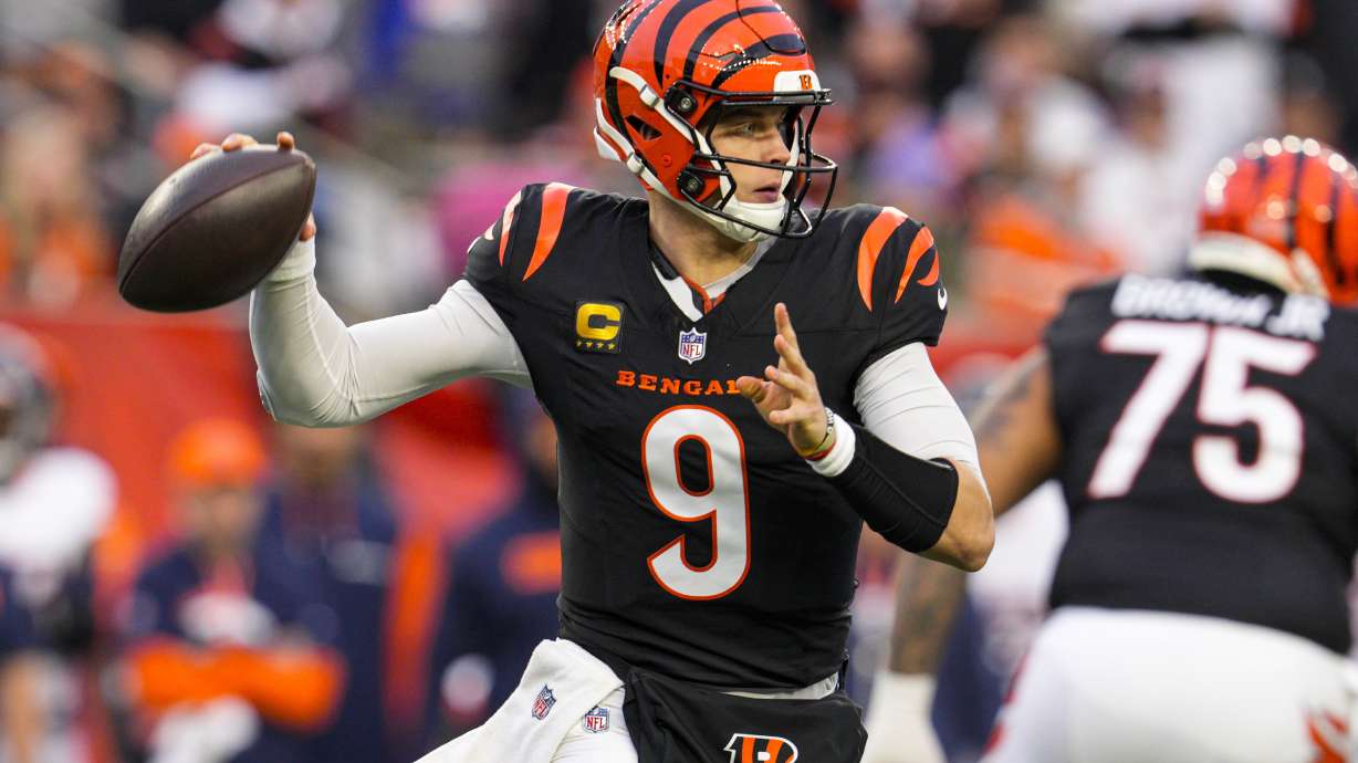 Cincinnati Bengals quarterback Joe Burrow (9) throws against the Denver Broncos during the first half of an NFL football game in Cincinnati, Saturday, Dec. 28, 2024.