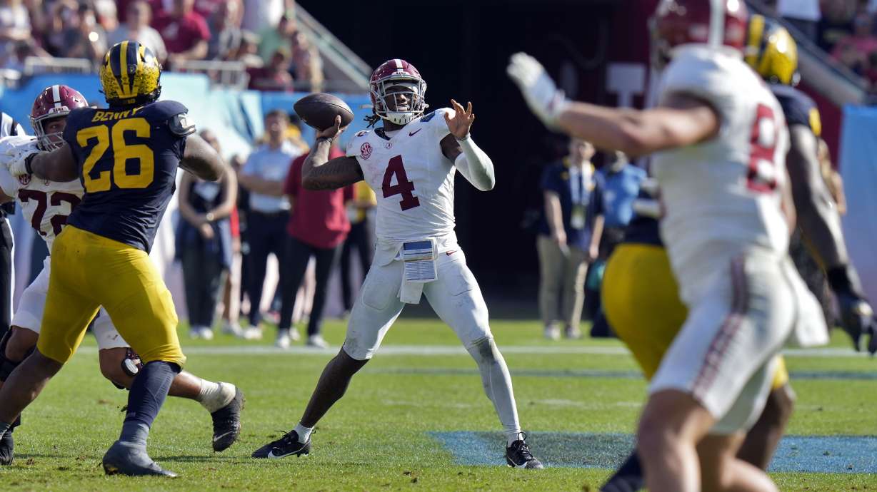 Alabama quarterback Jalen Milroe (4) throws a pass against Michigan during the second half of the ReliaQuest Bowl NCAA college football game Tuesday, Dec. 31, 2024, in Tampa, Fla.