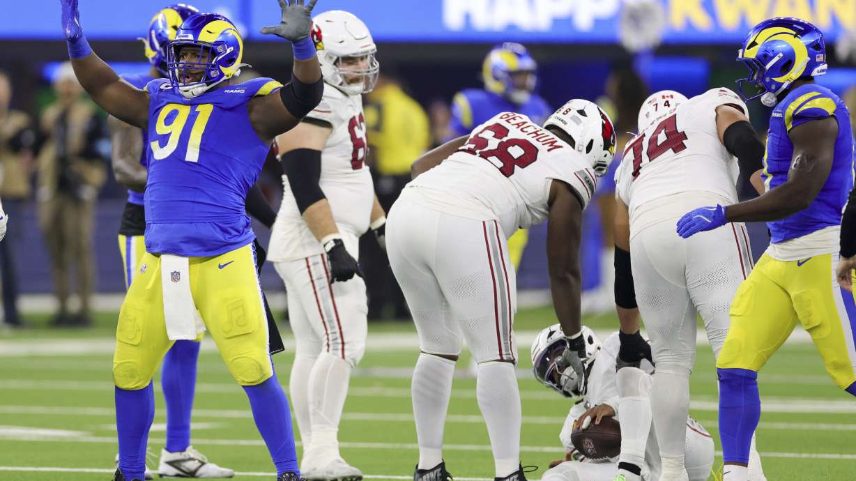 Los Angeles Rams defensive tackle Kobie Turner (91) celebrates after sacking Arizona Cardinals quarterback Kyler Murray during the second half of an NFL football game Saturday, Dec. 28, 2024, in Inglewood, Calif.