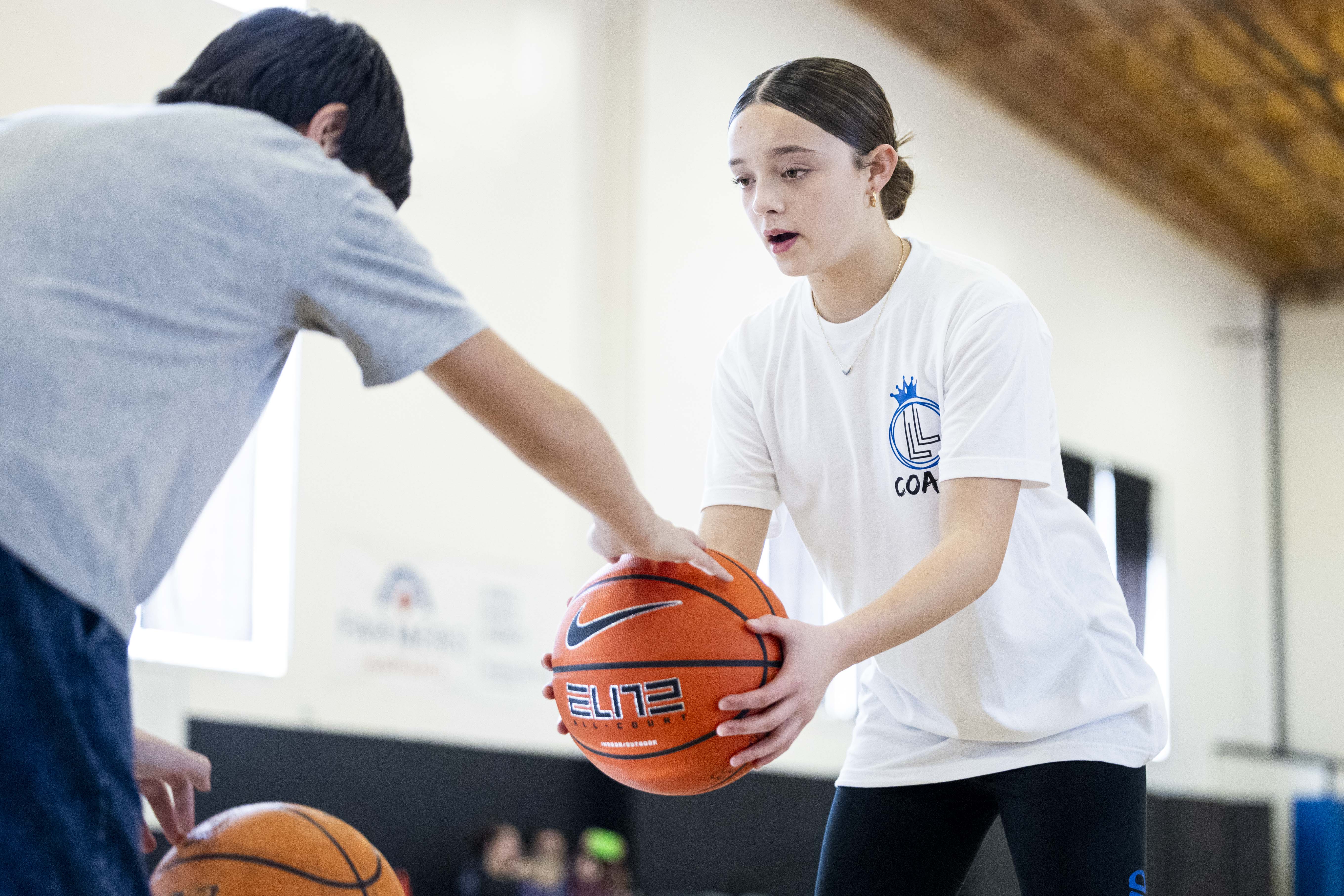 Basketball camp teaches layups, leadership skills with help of young coaches