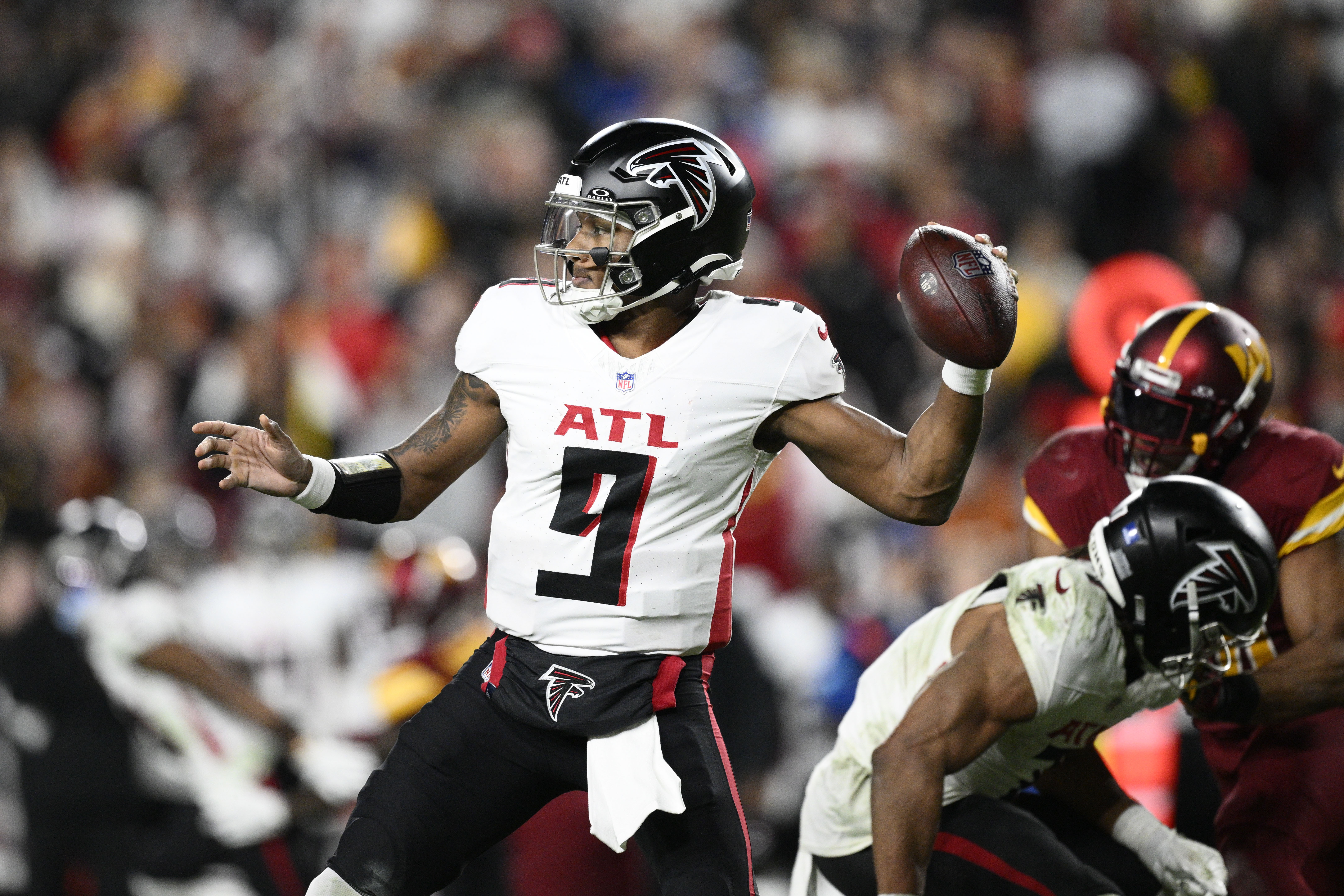 Atlanta Falcons quarterback Michael Penix Jr. (9) passes during the second half of an NFL football game against the Washington Commanders, Sunday, Dec. 29, 2024, in Landover, Md.