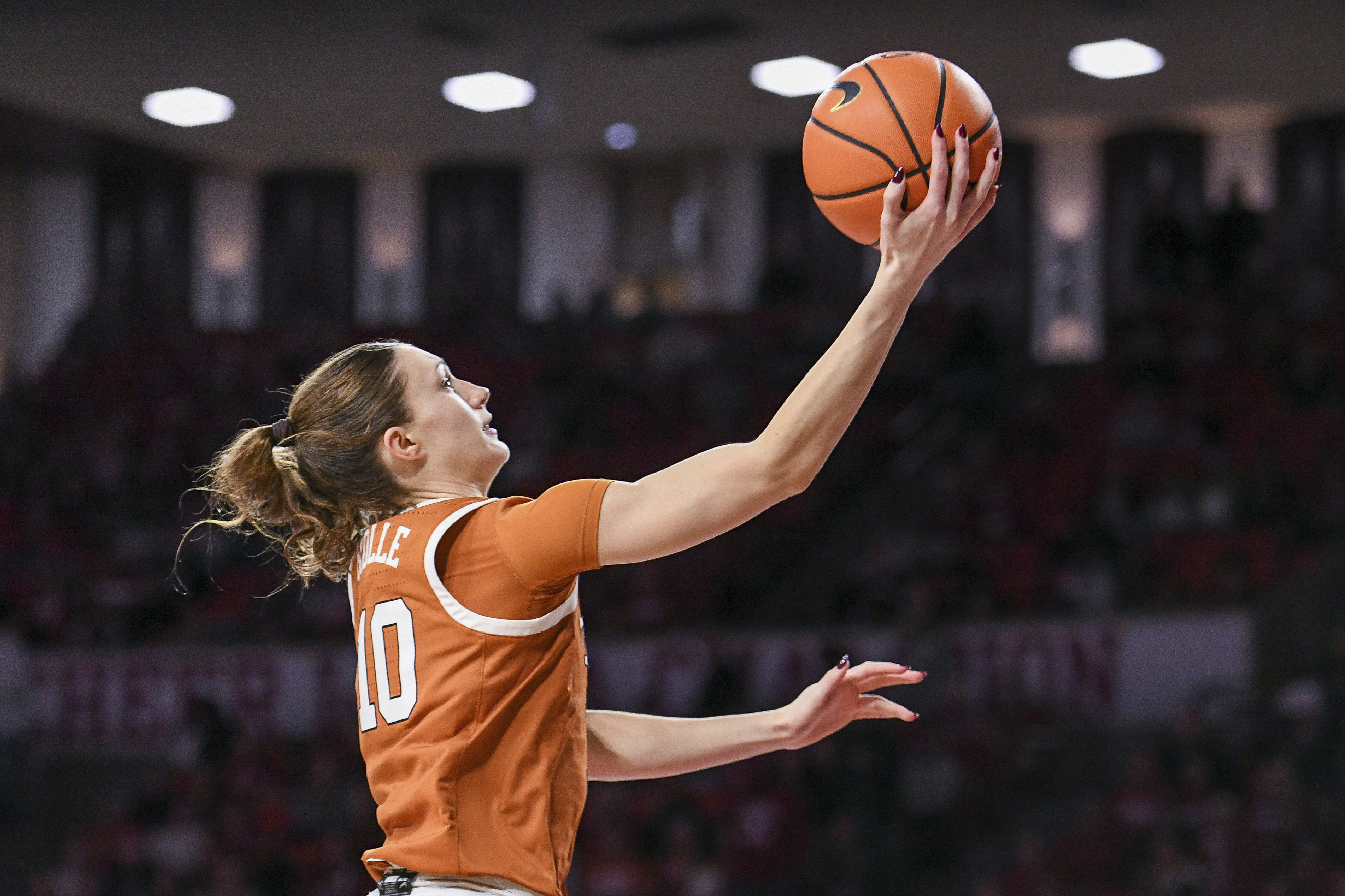 Texas guard Shay Holle shoots during the second half of an NCAA college basketball game against Oklahoma, Thursday, Jan. 2, 2025, in Norman, Okla.
