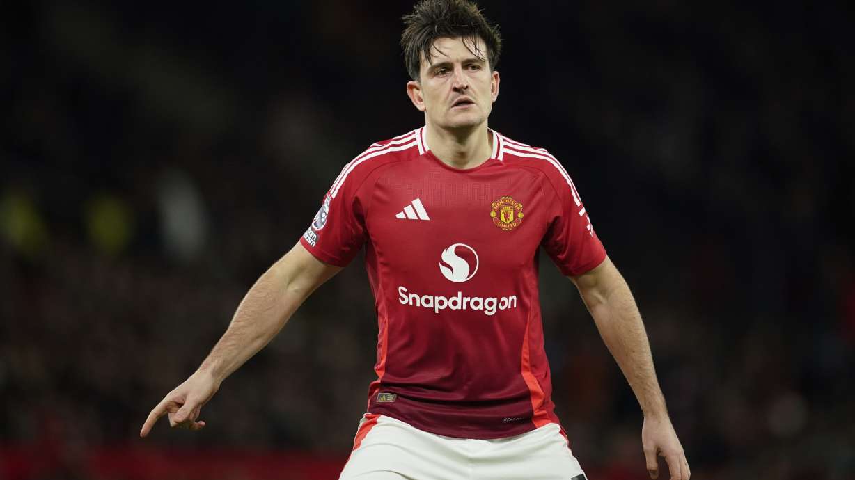 Manchester United's Harry Maguire reacts during the English Premier League soccer match between Manchester United and Newcastle at the Old Trafford stadium in Manchester, England, Monday, Dec. 30, 2024.