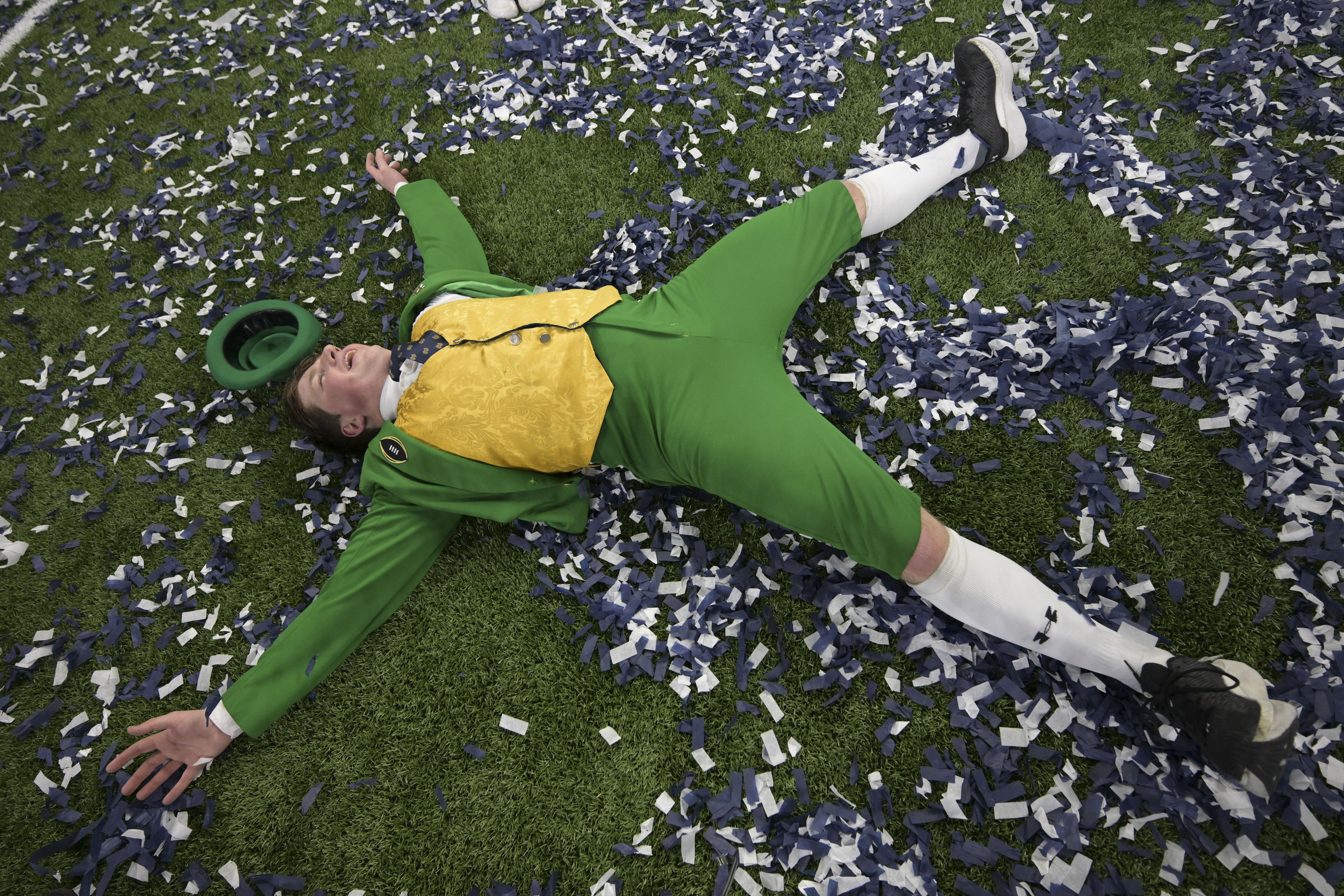 Notre Dame mascot Colin Mahoney celebrates after a quarterfinal game against Georgia in a College Football Playoff, Thursday, Jan. 2, 2025, in New Orleans.