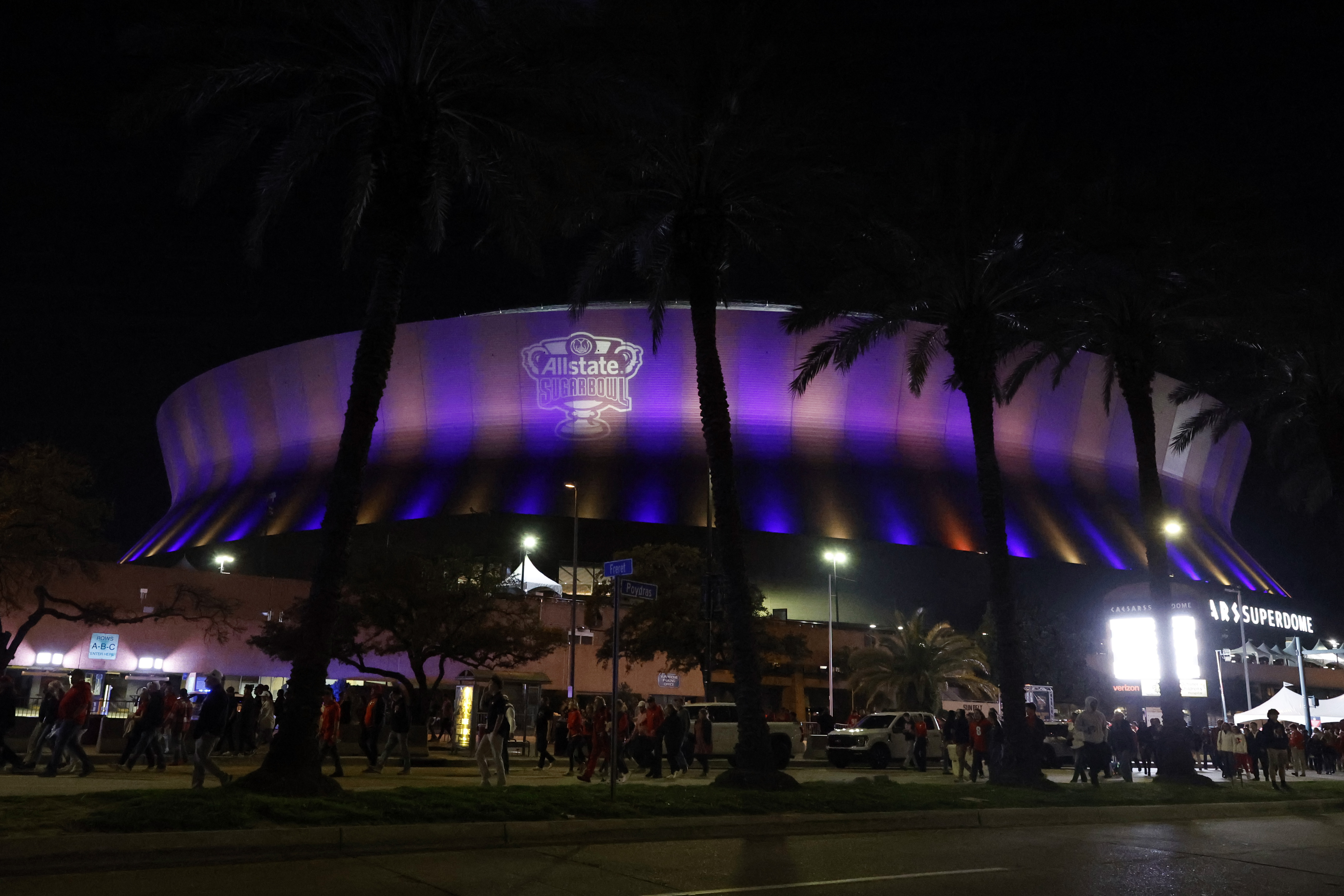 Fans leave the Caesars Superdome after the Sugar Bowl NCAA College Football Playoff game, Thursday, Jan. 2, 2025, in New Orleans.