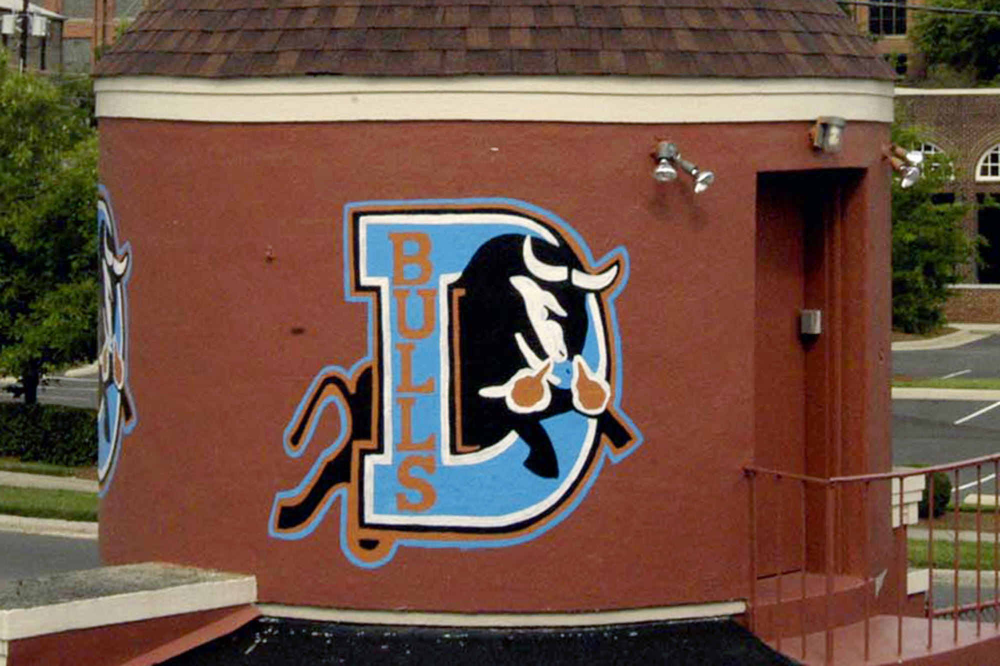 FILE - The Durham Bulls tower at the main gate of the historic Durham Athletic Park displays the team's logo on June 13, 2004 in downtown Durham, N.C.