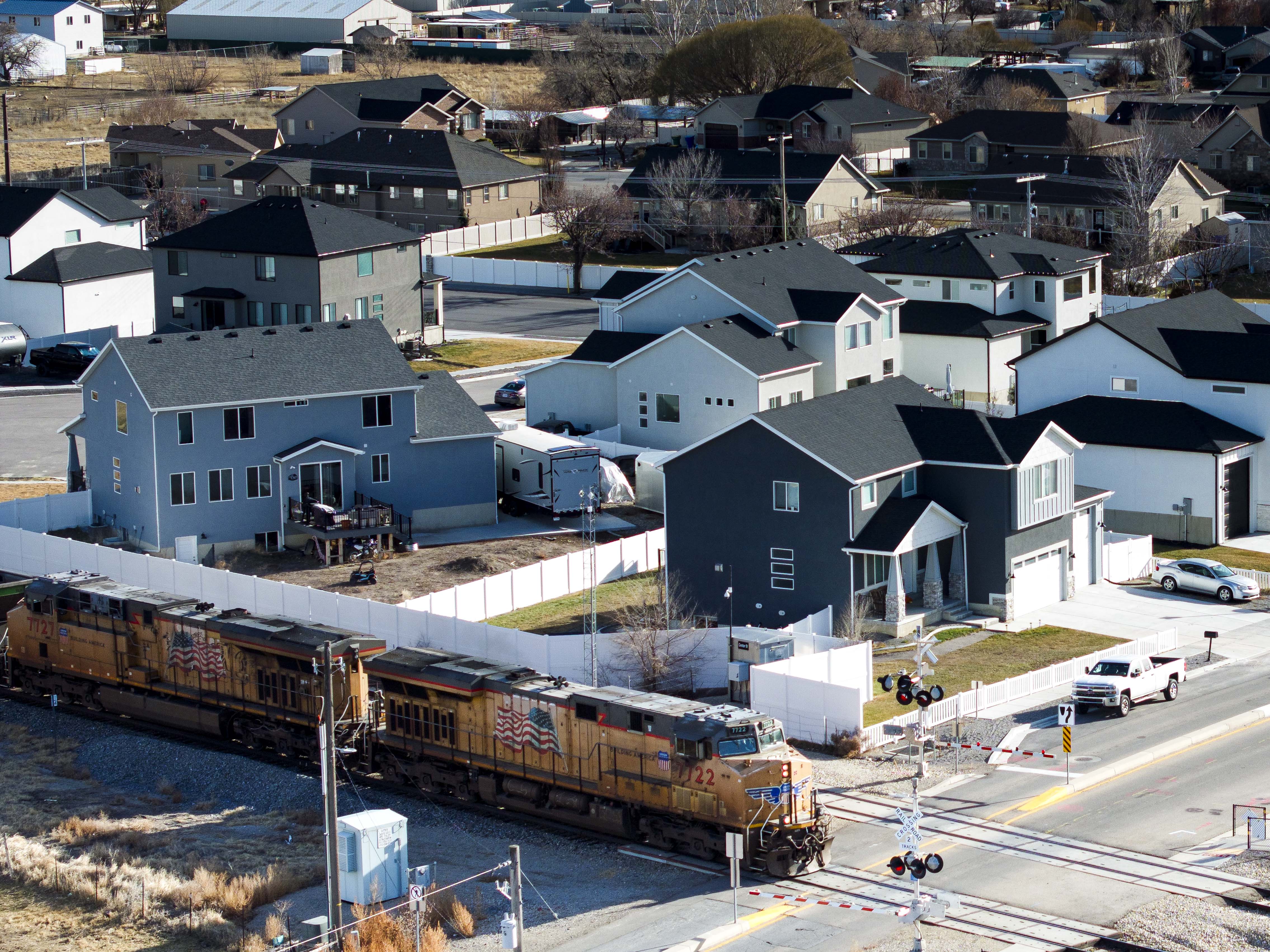 A train moves north at a railroad crossing along Center Street in Lehi on Thursday. City officials said Friday the Federal Railroad Administration has reinstated the "quiet zone" between Provo and Salt Lake City.