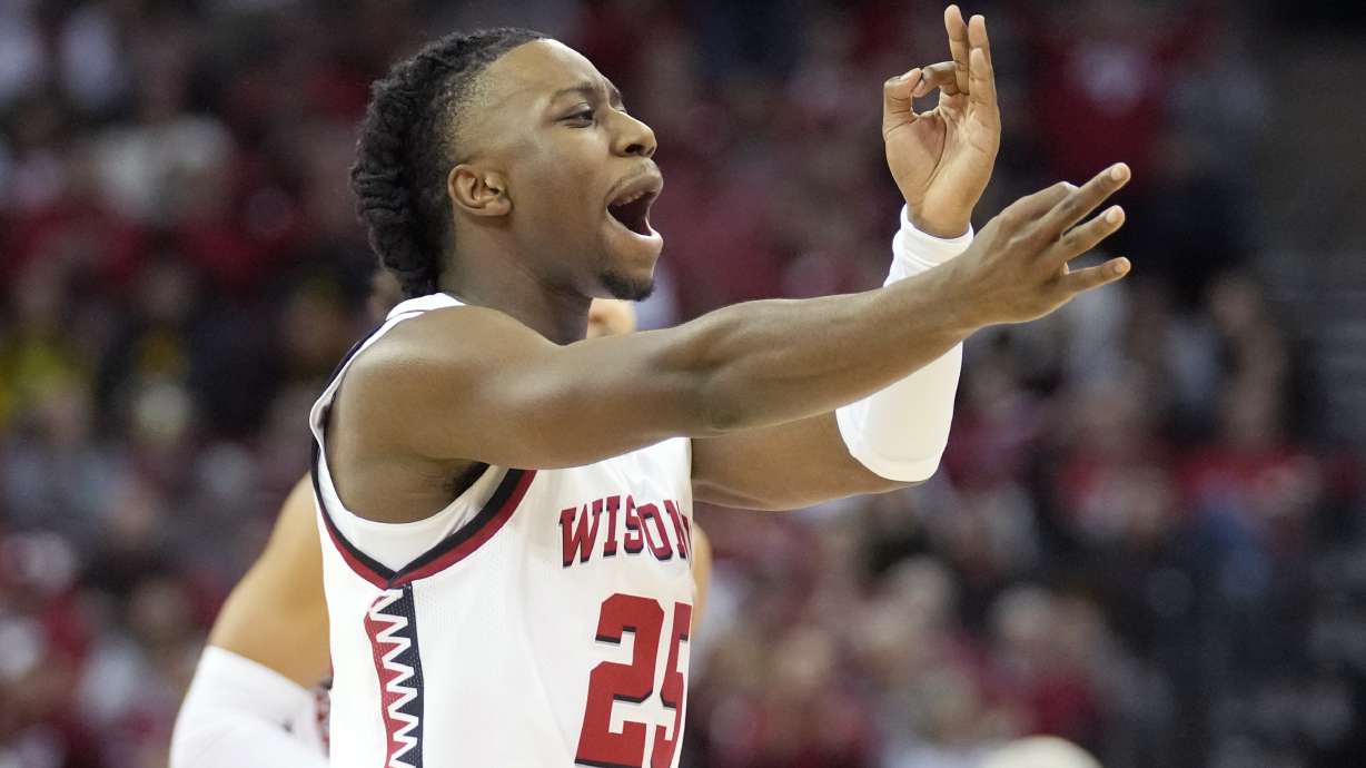 Wisconsin guard John Blackwell (25) celebrates after a 3-point basket during the first half of an NCAA college basketball game against Iowa, Friday, Jan. 3, 2025, in Madison, Wis.