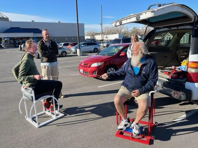 Jed and Sheri Jensen meet new friends from Bozeman, Montana, who picked up two of Jed's Chairs for their fencing club.