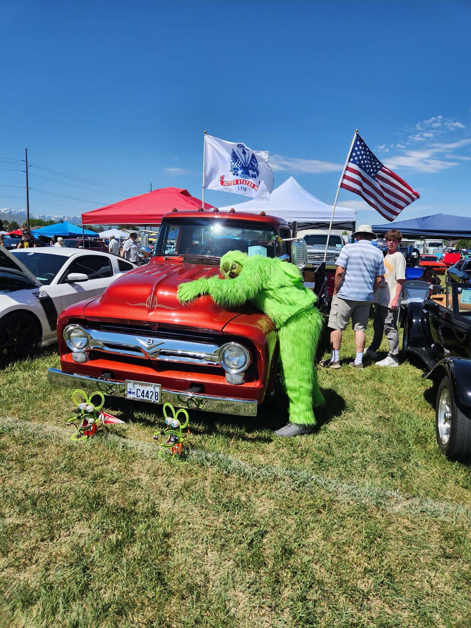 Jed Jensen dressed as the Grinch at a fundraiser car show.