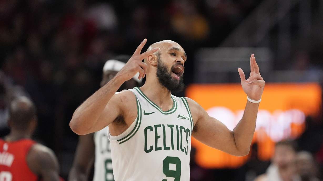 Boston Celtics' Derrick White (9) celebrates after making a 3-pointer against the Houston Rockets during the second half of an NBA basketball game Friday, Jan. 3, 2025, in Houston. The Celtics won 109-86.