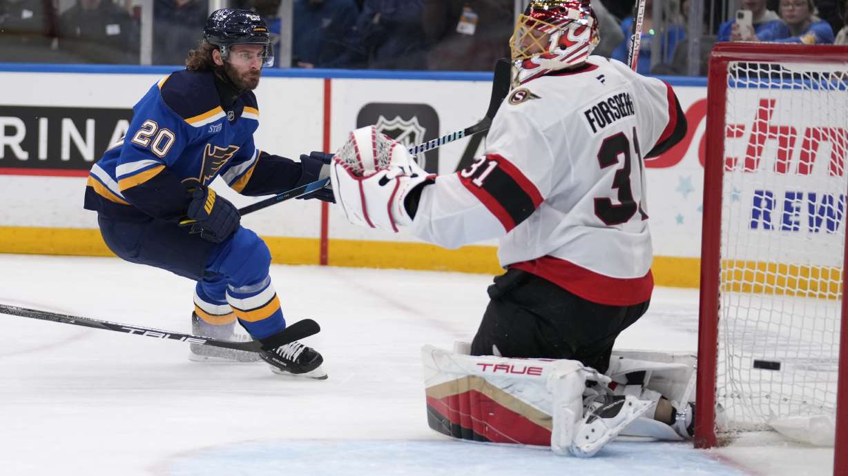 St. Louis Blues' Brandon Saad (20) scores past Ottawa Senators goaltender Anton Forsberg (31) during the second period of an NHL hockey game Friday, Jan. 3, 2025, in St. Louis.
