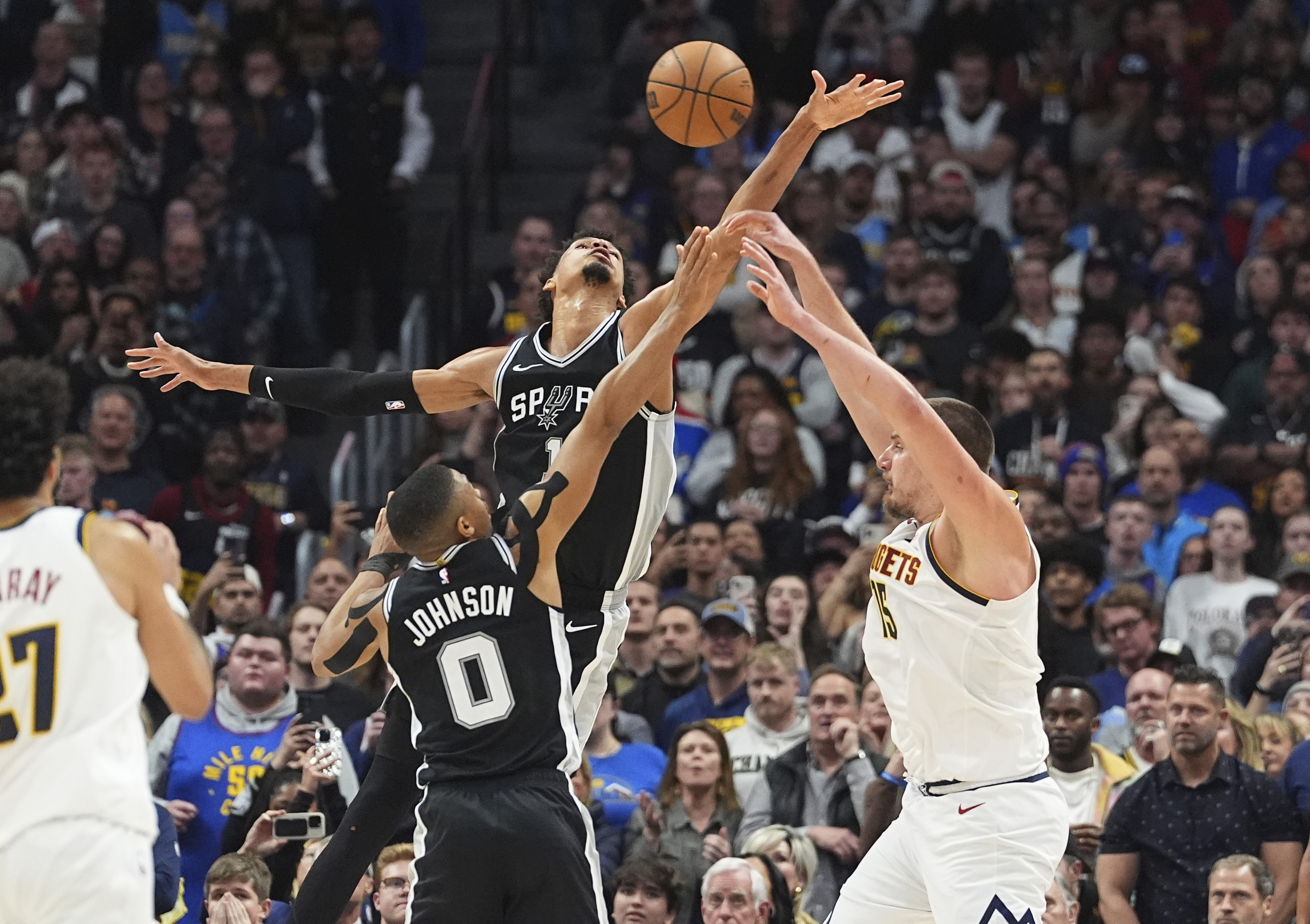 Wembanyama denies Jokic in closing seconds as Spurs beat Nuggets 113-110