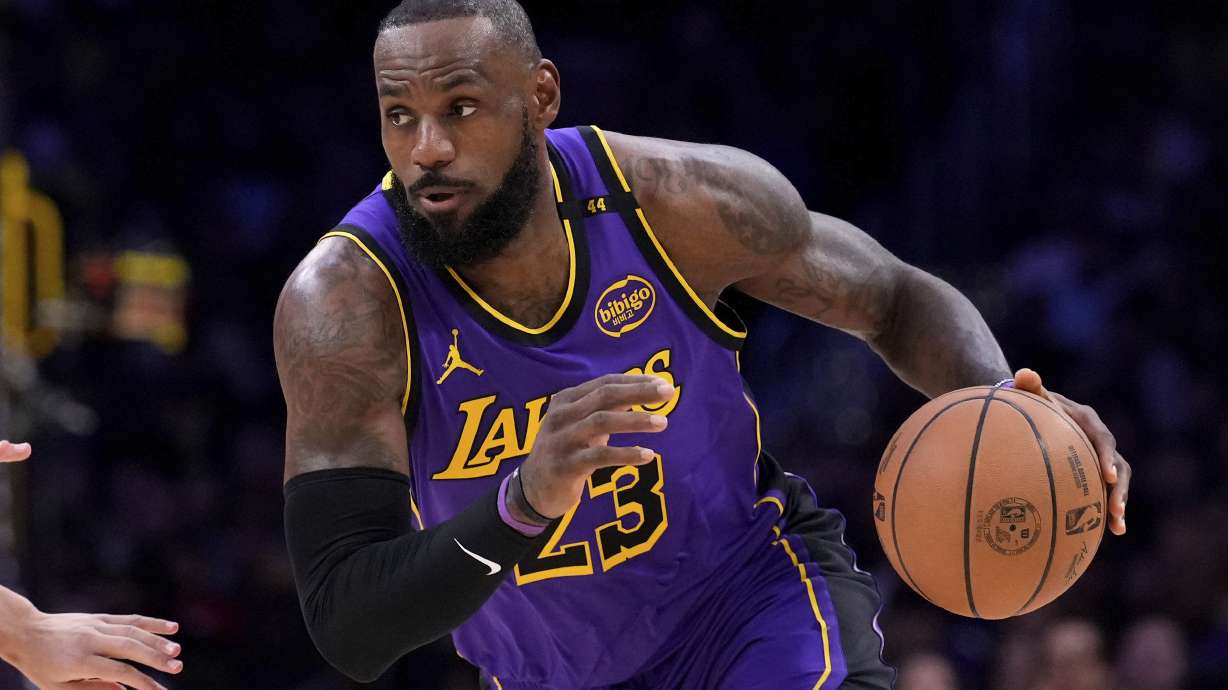 Los Angeles Lakers forward LeBron James drives toward the basket during the first half of an NBA basketball game against the Atlanta Hawks, Friday, Jan. 3, 2025, in Los Angeles.
