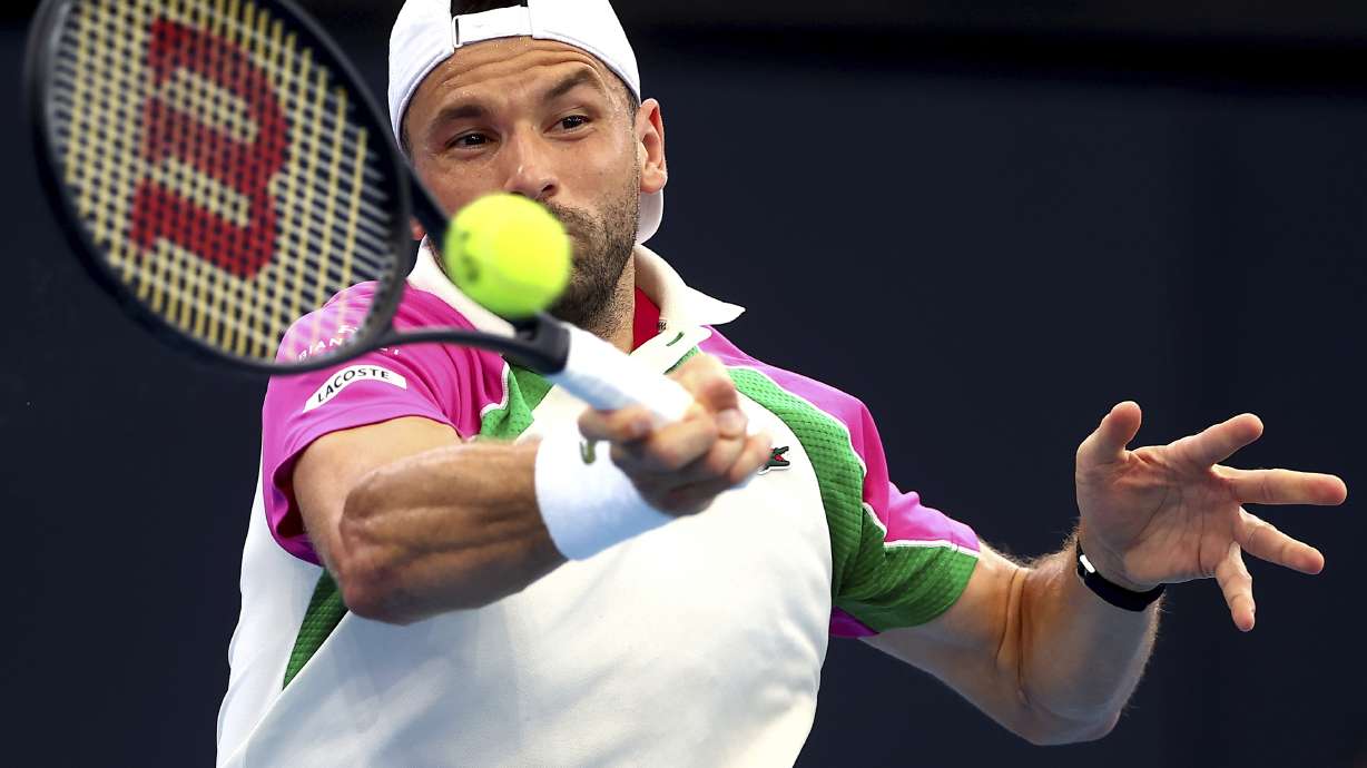 Bulgaria's Grigor Dimitrov plays a forehand against Czech Republic's Jiri Lehecka during their semi-final match at the Brisbane International in Brisbane, Australia, Saturday, Jan. 4, 2025.