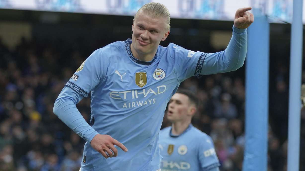 Manchester City's Erling Haaland celebrates after scoring his side's 2nd goal against West Ham during a English Premier League soccer match at Etihad stadium in Manchester, England, Saturday, Jan. 4, 2025.