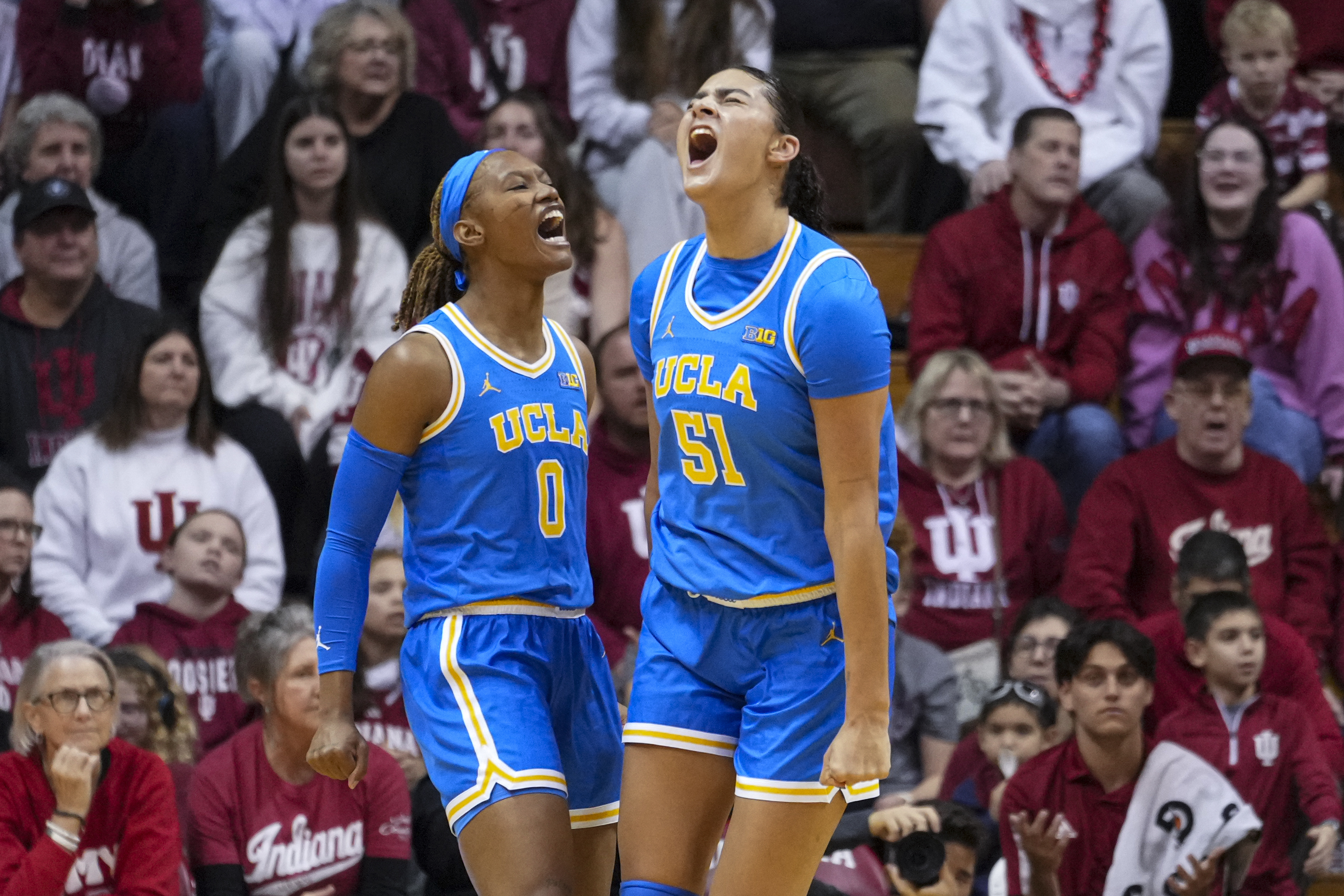 UCLA center Lauren Betts (51) celebrates after being fouled by Indiana with forward Janiah Barker (0) in the first half of an NCAA college basketball game in Bloomington, Ind., Saturday, Jan. 4, 2025.