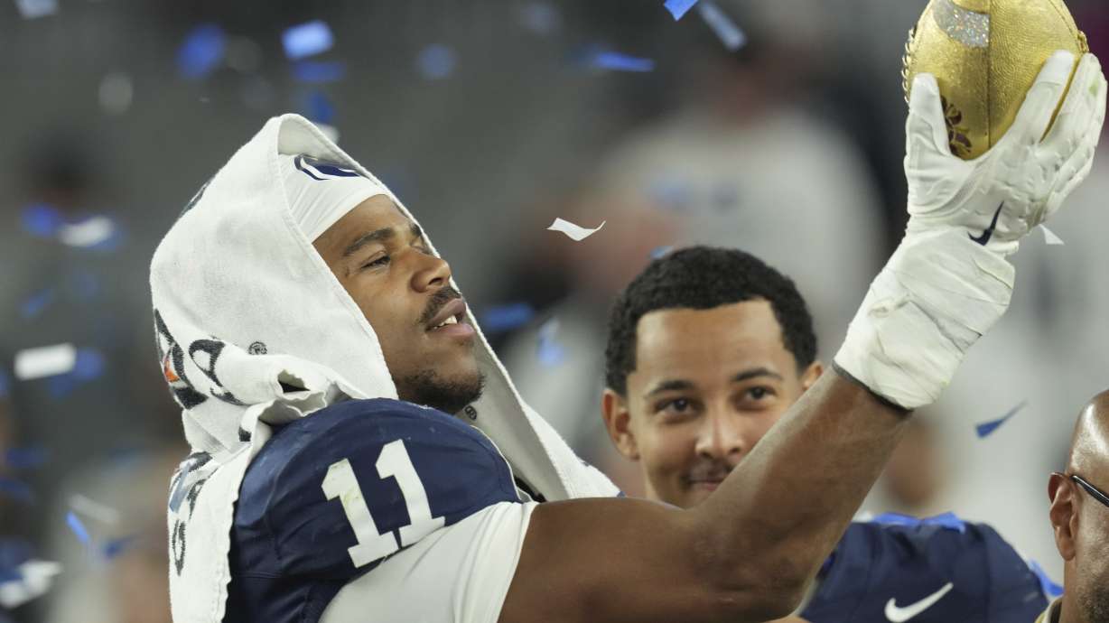 Penn State defensive end Abdul Carter (11) celebrates after the Fiesta Bowl College Football Playoff game against Boise State, Tuesday, Dec. 31, 2024, in Glendale, Ariz.