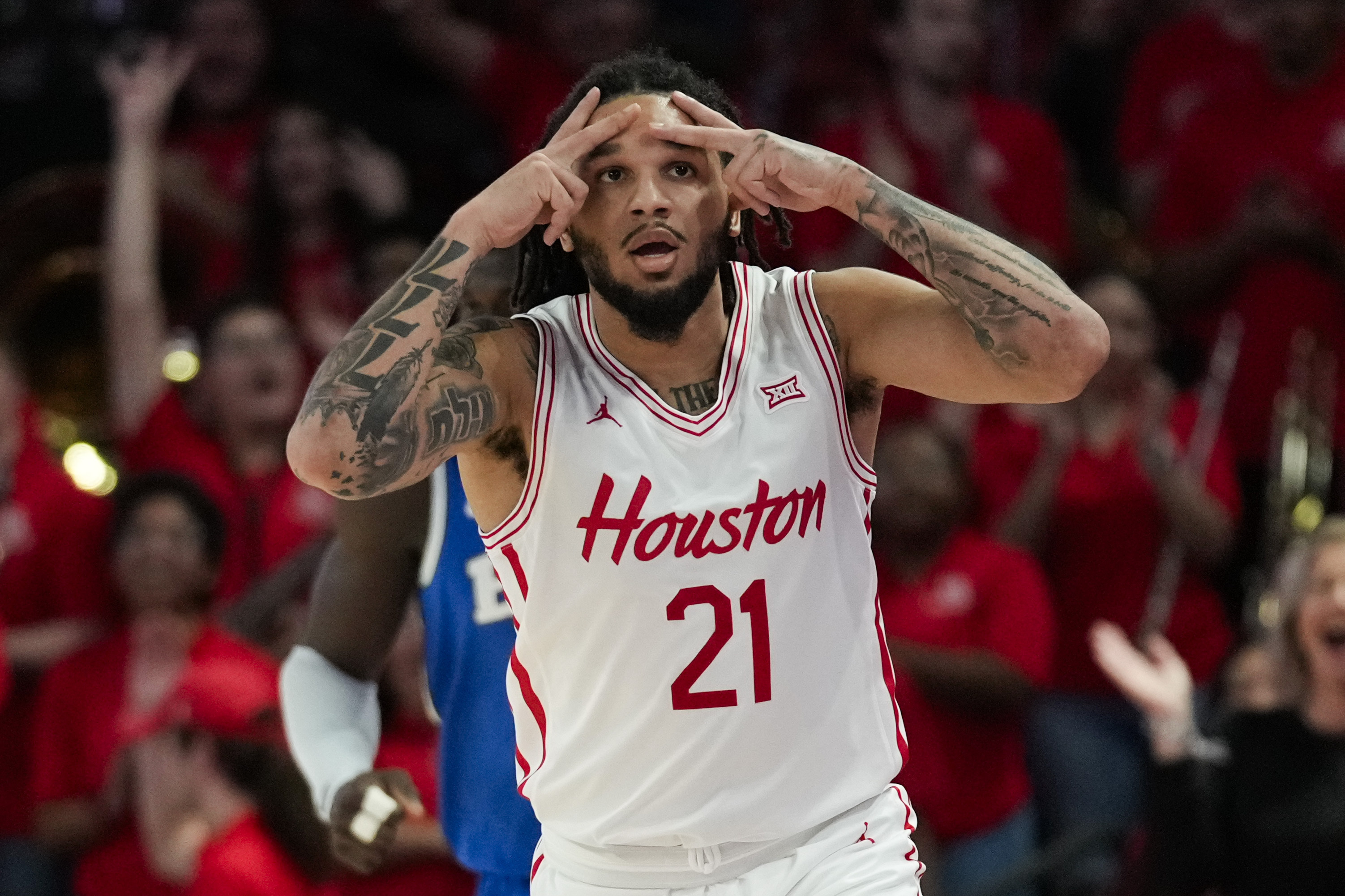 Emanuel Sharp scores 18 to lead No. 14 Houston over BYU 86-55